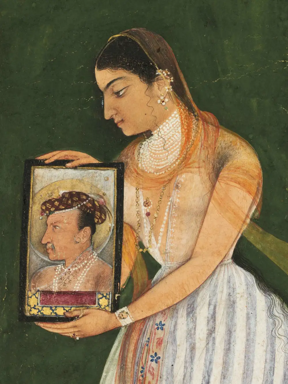 Nur Jahan holding a portrait of Emperor Jahangir, c. 1627